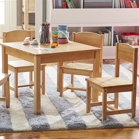 Uniquely designed with storage bins built-into the table, this set satisfies both a need for a furniture piece and a storage spot. . Kidkraft table and chairs